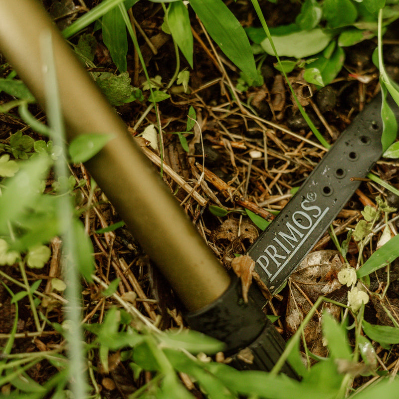 Load image into Gallery viewer, Primos hunting call on the ground among grass and leaves