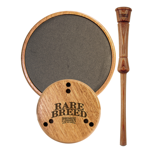 Primos Rare Breed™ Slate Turkey Call with striker stick, ideal for turkey hunting, on a white background.