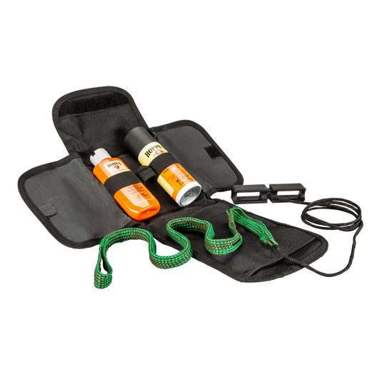 Black pouch with shotgun cleaning equipment including bottles and a green rope on a white background