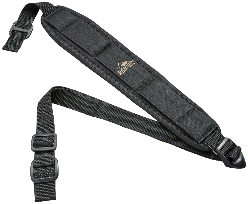 Load image into Gallery viewer, The Butler Creek Comfort Stretch Firearm Sling is black neoprene with an adjustable padded strap and logo on the pad.
