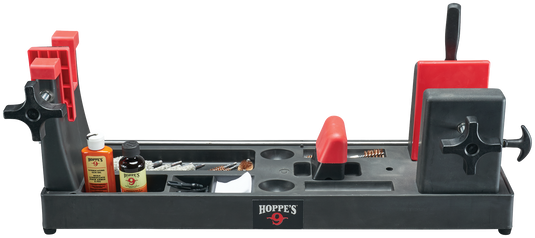 Hoppe’s Gun Vise offers organized firearm cleaning with tools and brushes in a convenient plastic stand.