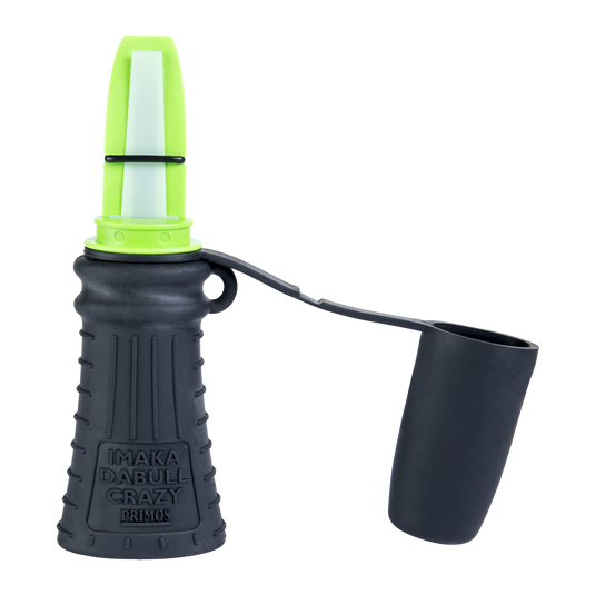A green and black Primos Imaka Da Bull Crazy Long Range Elk Call with a flexible black cover.