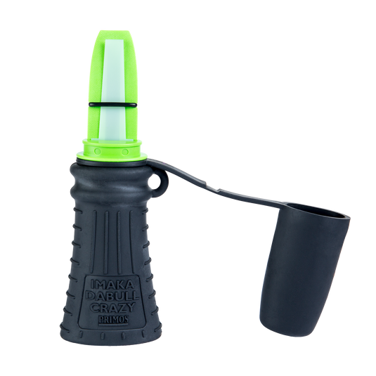 A green and black Primos Imaka Da Bull Crazy Long Range Elk Call with removable cover, perfect for cow elk calls.