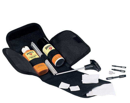 Gun cleaning bottles and tools displayed in black soft-sided case on a white background