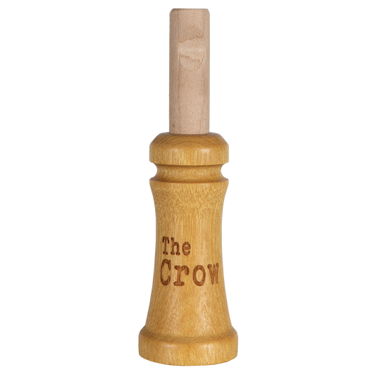 The Primos Crow Call, labeled The Crow, is a wooden hunting call with a cylindrical top and wider base.
