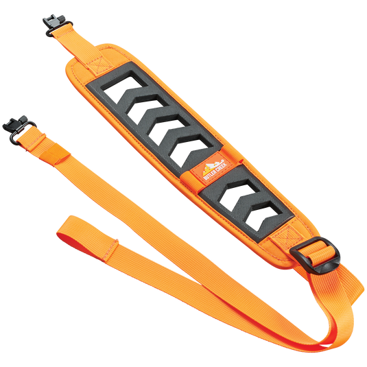 Bright orange and black Featherlight Sling by Butler Creek with buckle clips and chevron cutouts—ideal for shotguns.
