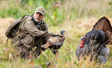 Man fixing his decoys