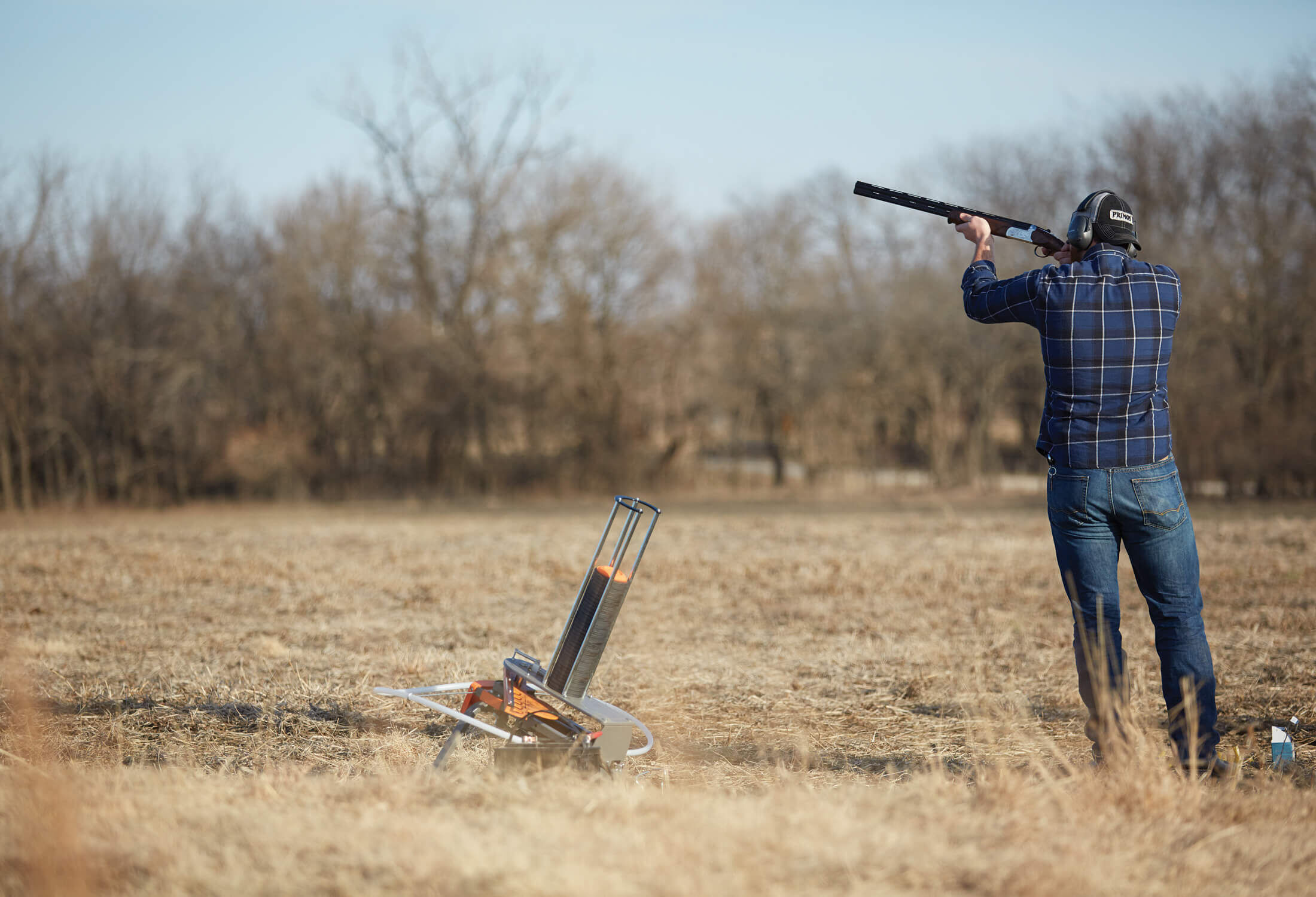 Champion Targets About Us Man shooting Champion targets