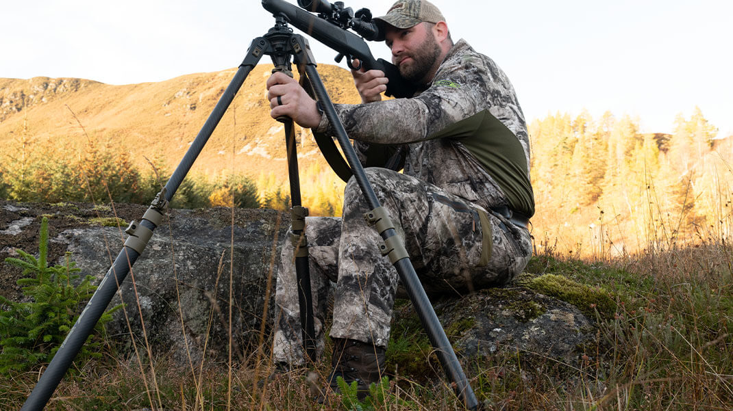 A Hunter Sitting with Apex Shooting Stick